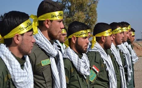 Hashd al-Shaabi fighters at graduation ceremony in Khurmatu. Feb, 2015. AFP Photo.
