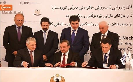 PM Barzani looks on as foreign investors sign a deal with Kurdish power company. Photo by: Farzin Hassan/Rudaw