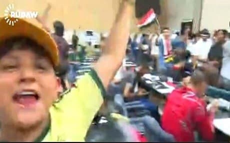 Protesters take over the Iraqi parliament in this screen grab from a Rudaw video.