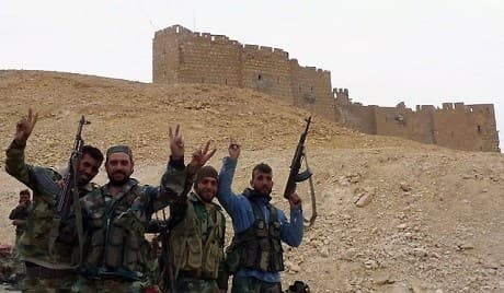 Syrian army soldiers celebrate victory in Palmyra. Photo: AFP