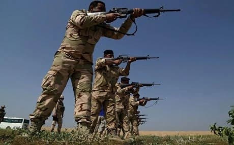 Iraqi soldiers with the 35th Iraqi Army Brigade practice reflexive fire drills during M16 rifle reflexive fire range training at The Besmaya Range Complex, Iraq, April 12, 2016. US Army photo by Sgt. Paul Sale