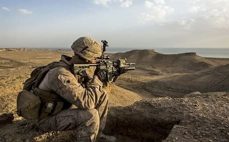 A US Marine scans the area during a perimeter patrol in Iraq. Photo: DoD.