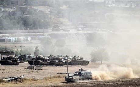The Turkish army is building up on the border with Syria following attacks on the town of Kilis. Photo: Bulent Kilic/AFP