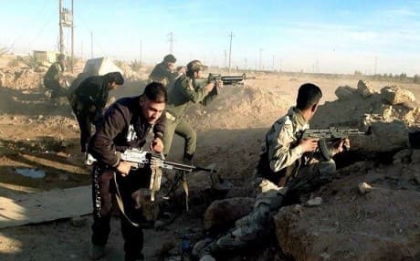 Iraqi Security Forces engage ISIS militants in Ramadi last December. AP photo.