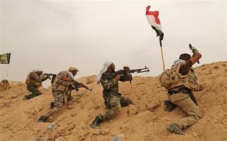 Shiite militias outside of Fallujah. AP photo.