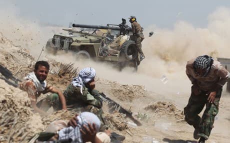 Shiite Hashd al-Shaabi militiamen on the outskirts of Fallujah 