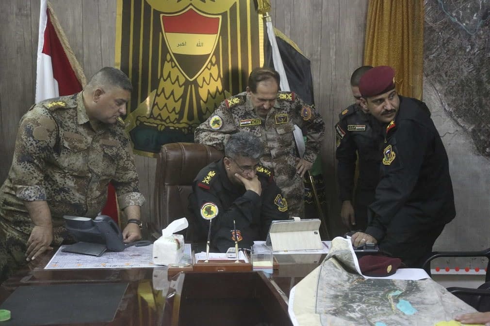 Iraqi commander of the Fallujah operation, Lt. Gen. Abdul-Wahab al-Saadi, is pictured in the operations centre. Photo: Khalid Mohammed/AP