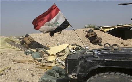Iraqi counter-terrorism forces battle Islamic State militants in Nuaimiya, Fallujah on Wednesday. Photo: Khalid Mohammed/AP