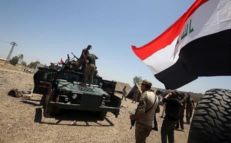 Iraqi security forces on the outskirts of Fallujah prepare to liberate the city. Photo: Ahmad al-Rubaye/AFP