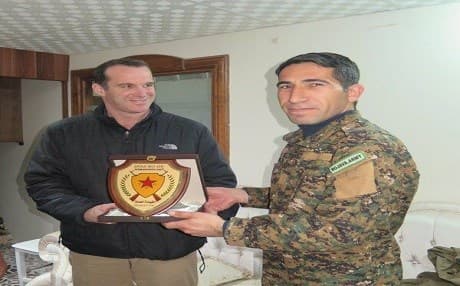US envoy to counter-Islamic State coalition Brett McGurk meeting the Syrian Kurdish YPG's Polat Can in Kobani earlier this year. 