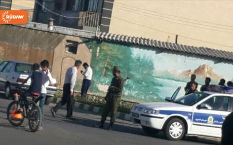 Civilians in front of a hospital in Shno following the eruption of clashes in the area.