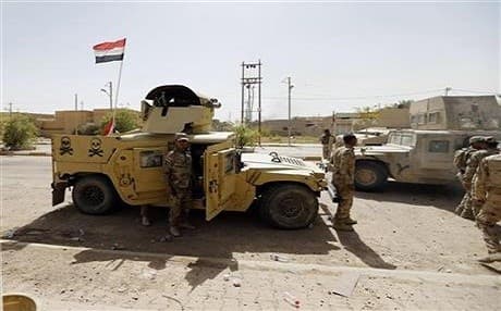 Iraqi security forces enter central Fallujah after fight against the Islamic State militants. Photo: AP 