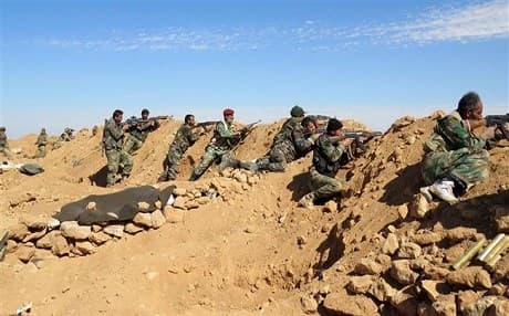Syrian soldiers hold their position in this February 19, 2016 AFP file photo.