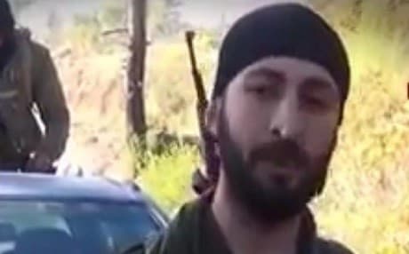 Alpharslan Celik (pictured) is suspected of killing Russian pilot Oleg Peshkov last November. Photo: Youtube screenshot. 