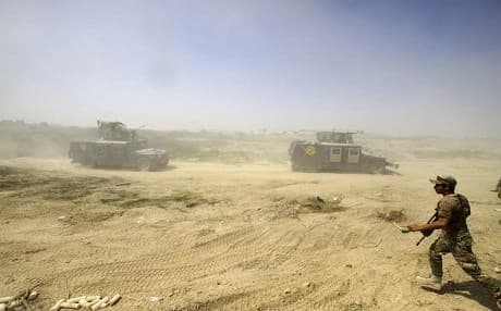 Iraqi army forces in Fallujah. AP photo
