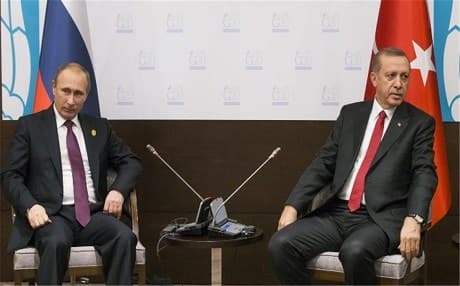 Russian Prime Minister Vladimir Putin (left) and Turkish President Recep Tayyip Erdogan (right). AP file photo.