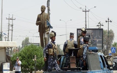 Members of the Kurdish security forces patrol a street in the city of Kirkuk. AFP File Photo.