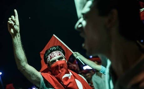 A pro-Erdogan supporter joins a rally in Istanbul’s Taksim Square three days after the attempted coup. Photo: Ozan Kose/AFP