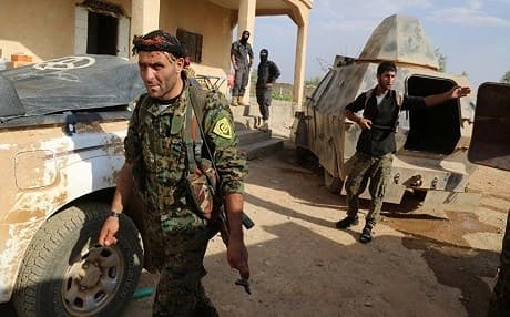 A Kurdish member of the Syrian Democratic Forces in Manbij. Photo: Delil Souleiman/AFP