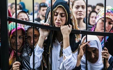 Women cry at the funeral of a victim of the failed coup. Photo: Gurcan Ozturk/AFP