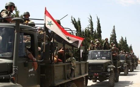 The Syrian Army, depleted from draft dodgers and deserters, is increasingly reliant on pro-regime militias. Photo: AP