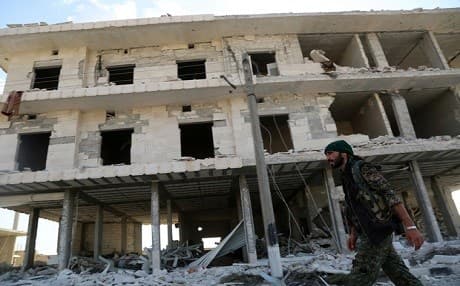 A Syrian Democratic Forces (SDF) fighter in the outskirts of Manbij. Photo: AFP