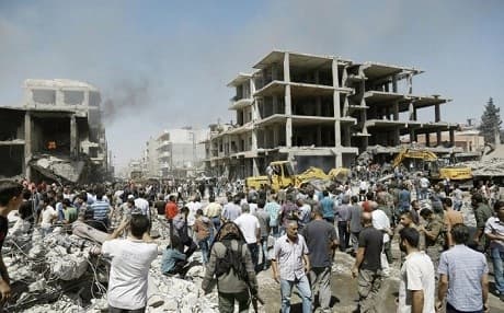 A massive bombing ripped through the Gharbi neighbourhood of Qamishli on July 27, killing 50. Photo: Delil Souleiman/AFP