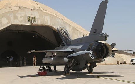 US made F16 fighter jets sits outside a hangar at Balad air base, 75 kilometers north of Baghdad. Photo: AP