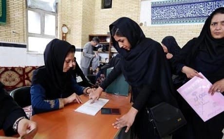 An Iranian woman votes in elections in Iran. Photo: AFP file photo