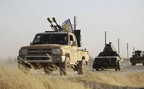 Syrian Democratic Forces (SDF) fighters on the move. AFP photo. 