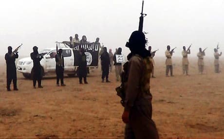 A group of Al-Qaeda-affiliated Islamic militants on the Iraq-Syria border. Photo: AP