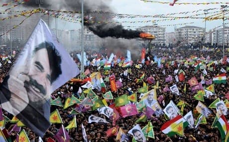 Supporters of the PKK wave posters of their leader Abdullah Ocalan during Newroz celebrations of 2015. AFP photo