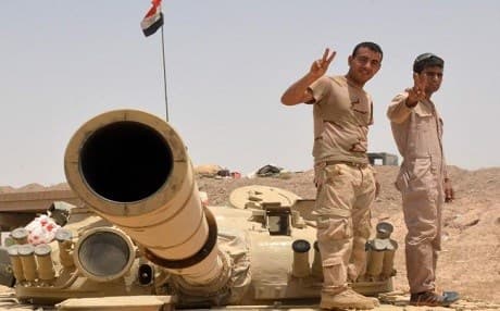 Iraqi security forces west of Qayara during an operation to retake the city centre. Photo: AFP