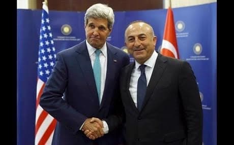 US Secretary of State John Kerry (left) and Turkish Foreign Minister Mevlut Cavusoglu (right). AFP file photo.