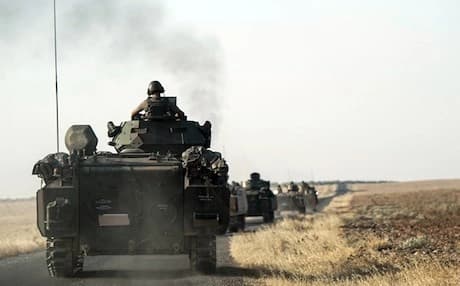 Turkish troops heading to the Syrian border in Karkamis, Turkey, on Saturday. Last Wednesday, Turkey sent tanks across the border to help Syrian rebels retake the key ISIS-held town of Jarablus and to contain the expansion of Syria's Kurds in areas bordering Turkey. AP photo.