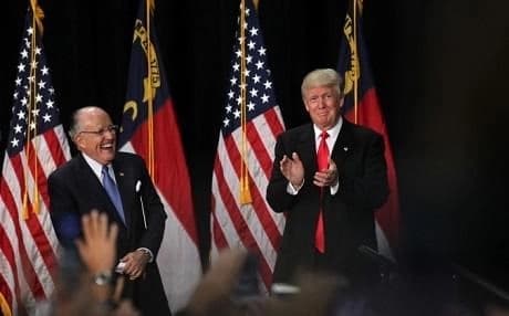 Rudy Giuliani (L) introduces Donald Trump (R) at a campaign event in Charlotte, North Carolina on August 18. Photo: Getty Images.