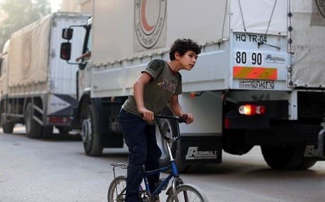 Twenty trucks of aid are on the Turkey-Syria border waiting for permits to be issued. Photo: Amer Almohibany/AFP