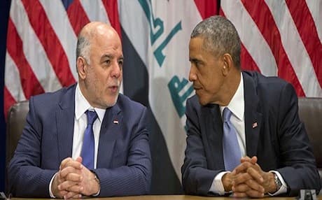 Haider al-Abadi (L) having a conversation with the US President Barack Obama. AP file photo