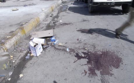 The bloodstained remains of victims killed or wounded by the bombing. Photo from AP video.