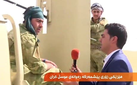 A Peshmerga convoy passed through Kirkuk on Saturday, headed for Mosul. Photo: Rudaw video