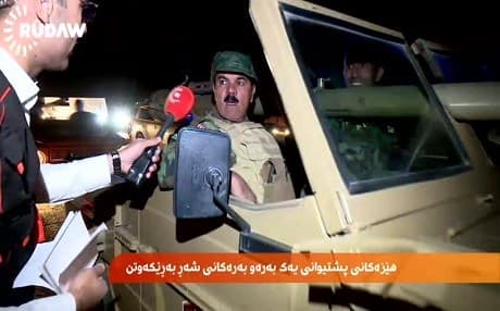 Peshmerga forces on their way to the frontlines hours before the operation was launched. Photo: Rudaw video