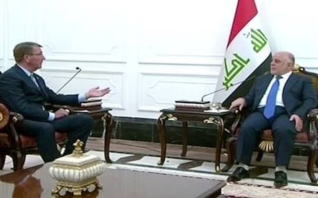 Iraqi Prime Minister Haider al-Abadi (right) meeting with US Secretary of Defense Ashton Carter in Baghdad on Saturday.  Photo from AP video.