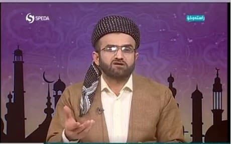 Dr. Wushyar Ismail presents a religious programe on Speda TV on Tuesday, the official satellite channel of the moderate Kurdistan Islamic Union. Photo:screenshot 