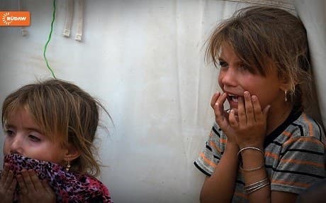 Two refugee children at a camp in the Kurdistan Region.