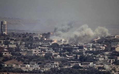 Smoke rises from a Syrian village in the Israeli-annexed Golan after an airstrike in September by Israeli aircraft. AFP file photo.