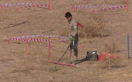 A de-miner from the Iraqi Kurdistan Mine Agency at work in Bashiqa. 