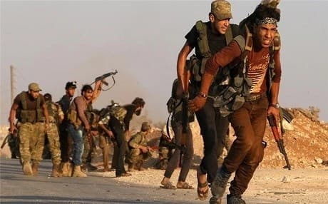 Turkish backed Syrian rebel fighters in their offensive against the positions of the so-called Islamic State in northern Syria. Photo: AFP