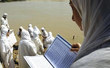 Members of Mandaean community take part in a purification ritual on the Tigris River in Baghdad. Photo AFP