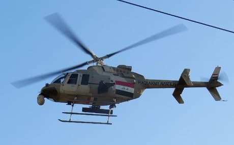 An Iraqi army helicopter flying in Ramadi in early 2016. Photo: Moadh al-Dulaimi/AFP