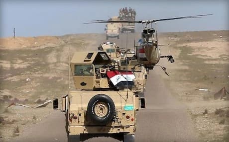Iraqi forces patrolling against ISIS  in Anbar province in March 2016. AP photo.